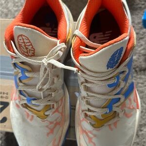 New Balance Women 2 WXY Sneakers in Cream, Blue, and Orange